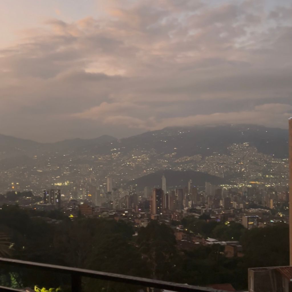 A quiet mountain city view at dusk during a personal travel reset.